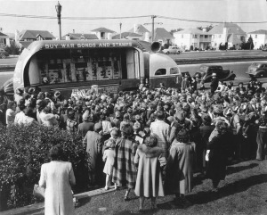 War bond sales in front of Commodore Sloat School in the 1940s. Junipero Serra Blvd. appears behind, paved now, as compared to 1927 photo above.